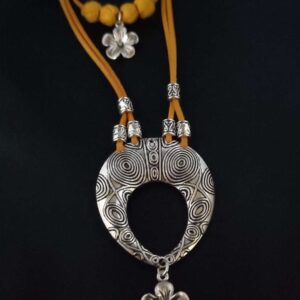 Oxidised Oval Pendant with Charms in Yellow Faux Leather Cord